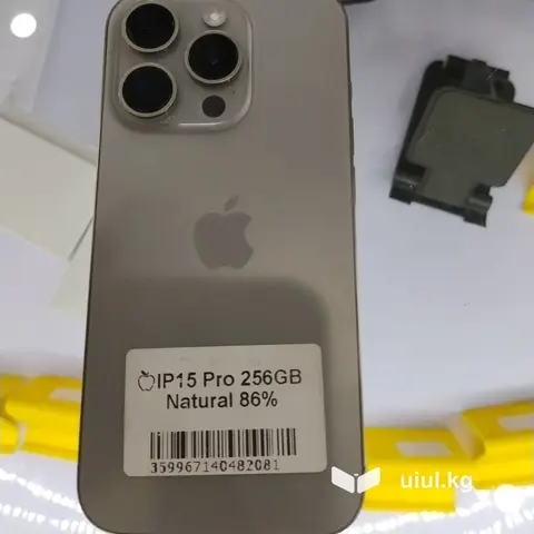 IPhone 15 Pro, 256 ГБ, цвет Natural Titanium. На стикере указано
